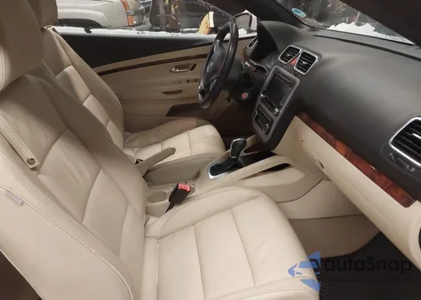 2012 Volkswagen Eos Executive z USA, uszkodzony, nr VIN WVWFW7AH0CV009066